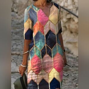 Beautiful dress, multi colors, wrinkle free material.